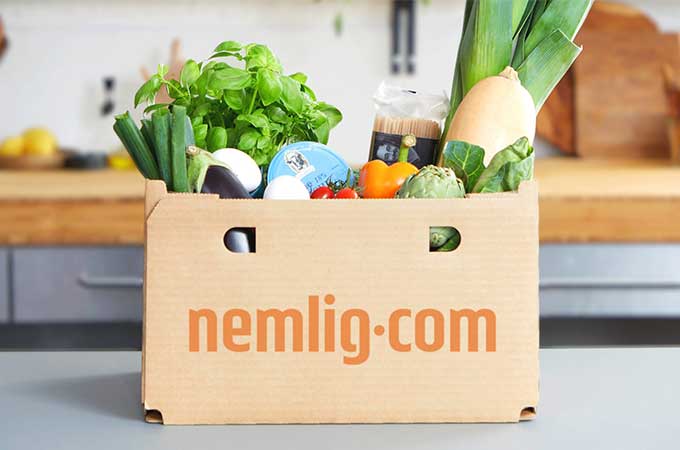 A scalable, recyclable paper-based packaging solution designed to complement reusable systems.